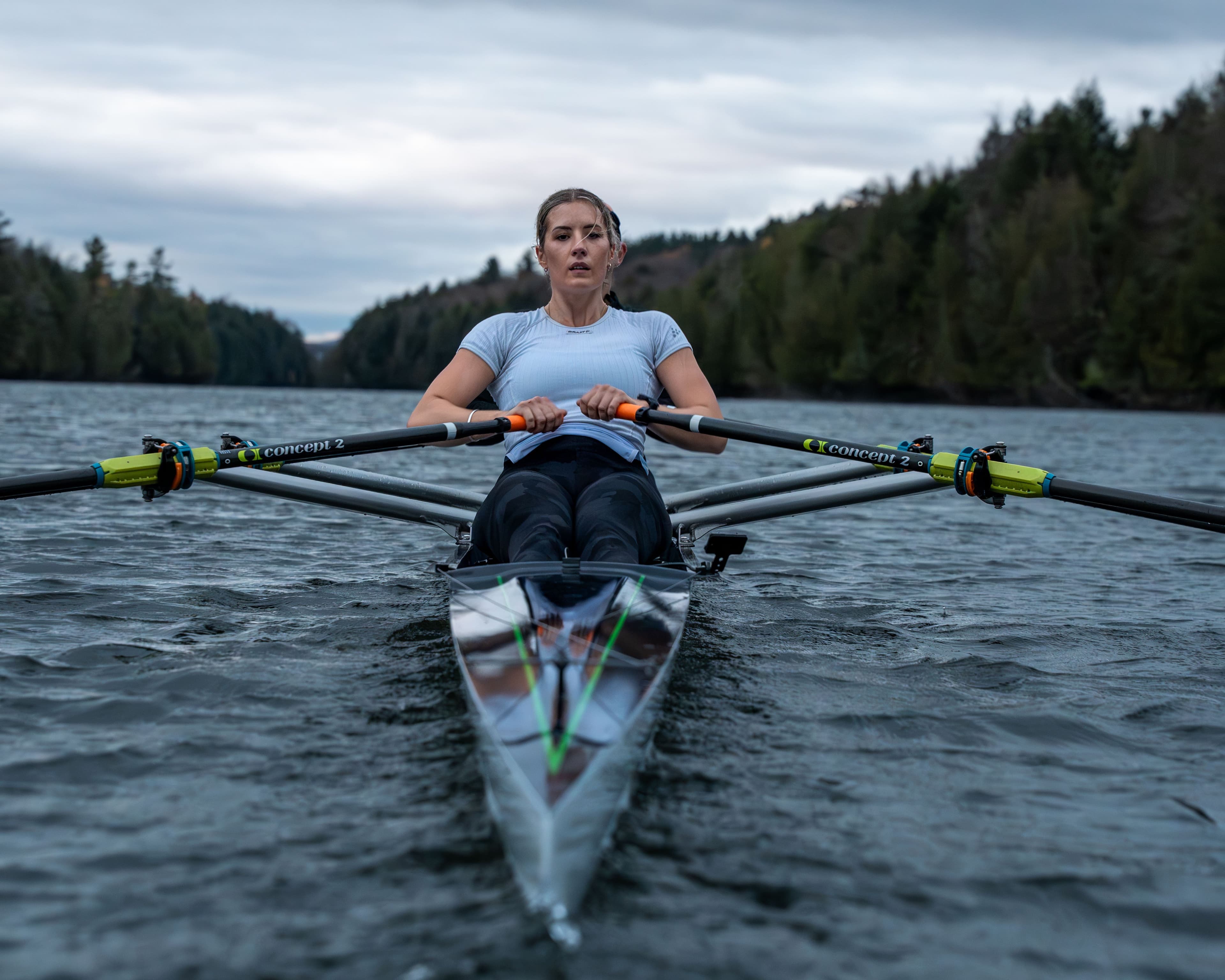 two women rowing on water with concept2 comp blades in a double