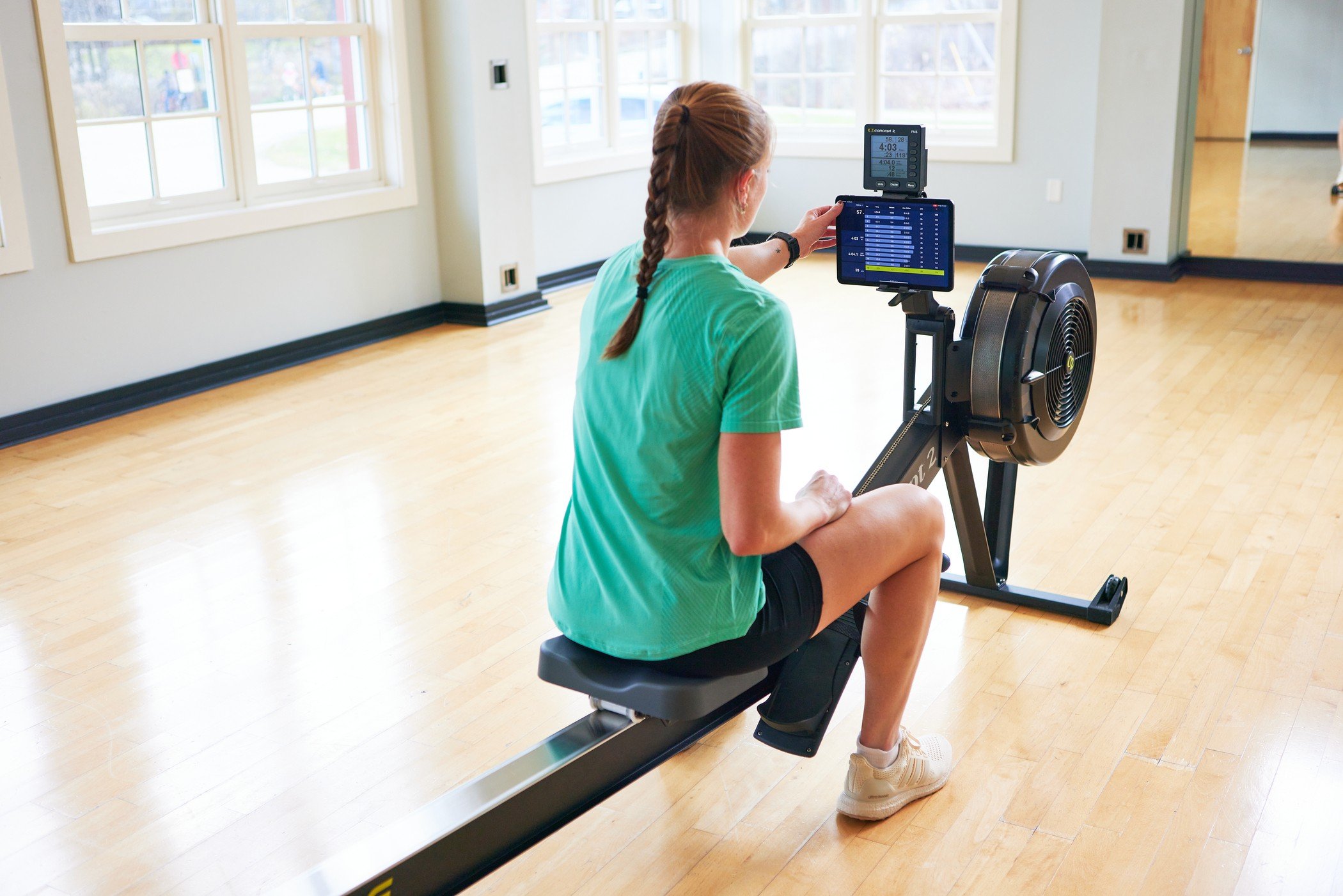 Woman on a rowerg with ergdata