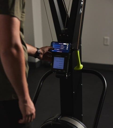 Person preparing a workout on the SkiErg with ErgData