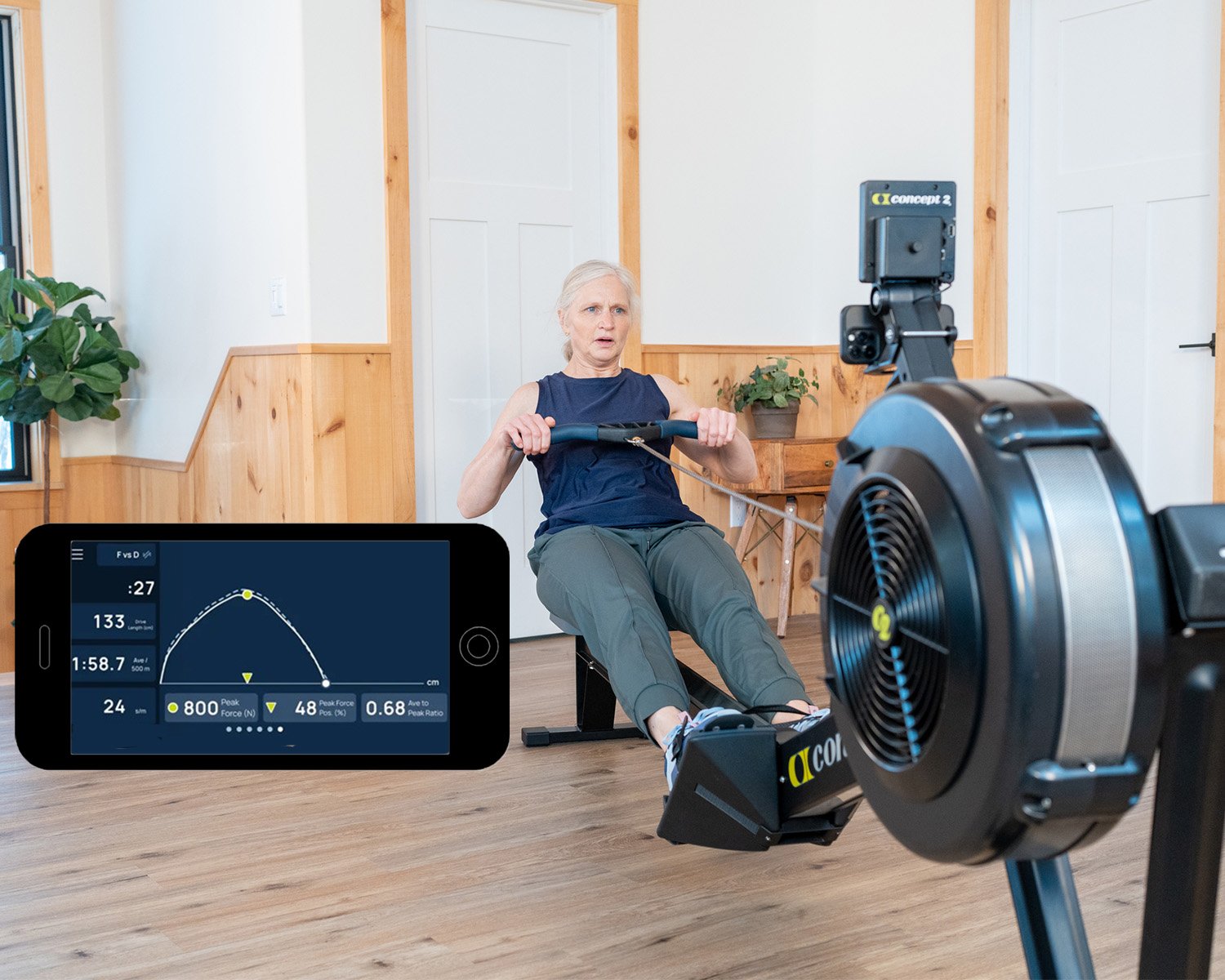 Woman on rower using ergdata force curve