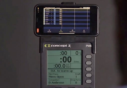 Image of PM5 with a phone running ErgRace
