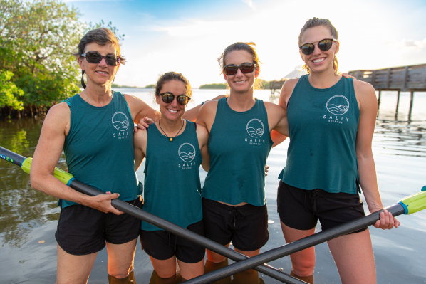 the team holding oars